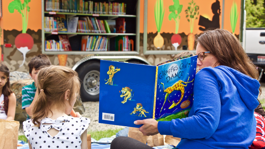 story time at the Bloom mobile Bookmobile