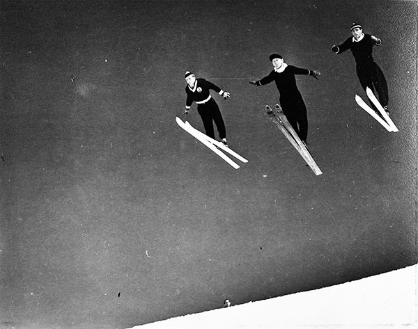 Photo of 3 ski jumpers