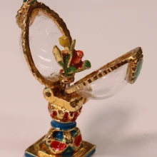A miniature Fabergé-style egg, shown open. Egg Sculpture