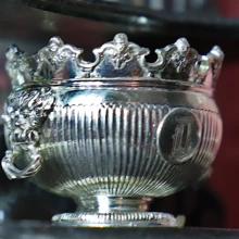 A silver bowl for punch or chilling wine. Silver Monteith Bowl